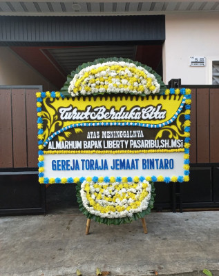 Papan Bunga Duka di Sendangrejo